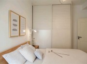 簡(jiǎn)雅的北歐風(fēng)格三居室臥室衣柜裝修效果圖 簡(jiǎn)雅的北歐風(fēng)格三居室臥室衣柜裝修效果圖