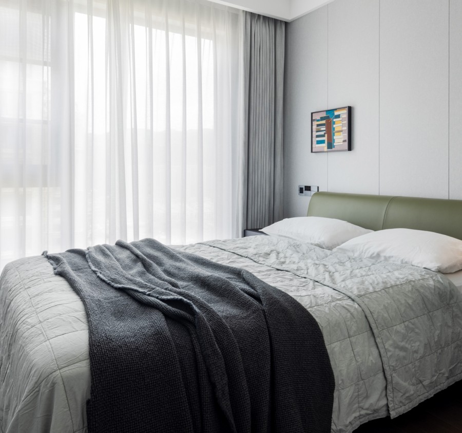 現代簡約三居室裝修臥室效果圖